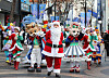 Everland hosts a Christmas parade in the Myeong-dong neighborhood of Jung District, central Seoul, on Monday morning. [YONHAP]