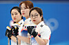 From left: Kim Kyeong-ae, Kim Cho-hi and Kim Seon-yeong watch the play during a game against Switzerland at the National Aquatics Center in Beijing on Wednesday. [REUTERS/YONHAP]