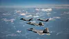 South Korean F-35A and U.S. F-22 fighters take part in a joint combat drill in an apparent show of force against North Korean military threats over a central region in South Korea in a photo provided by the U.S. Air Force on May 16. [YONHAP]