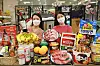 Models pose with camping-related products at Lotte Mart in Jung District, central Seoul on Wednesday, ahead of a camping discount event to run from today to March 24. [YONHAP]