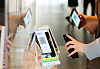 People scan QR codes at the National Museum of Modern and Contemporary Art (MMCA) in Jongno District, central Seoul, on Monday. Starting Monday, vaccine passes are effective for six months, requiring people to get booster shots to enter most businesses, including cafes, gyms and cultural facilities if they got their second shot over six months earlier. [NEWS1]