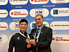 Park Hee-jun holds his bronze medal with his coach Ahmad Safi, after finishing third in the men's Kata at the 2020 Olympic Qualification Tournament in Paris on Saturday.  [Korea Karate Federation]