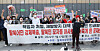 Members of the North Korean Women Defectors' Alliance held a protest outside the Democratic Party's headquarters in Yeouido, southern Seoul, on Sunday, urging punishment of officials involved in the 2019 repatriation incident. [NEWS1]