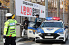 With police help, a test-taker arrives at the testing site at Yongsan High School in Yongsan District, central Seoul, on last year’s university entrance exam day, Nov. 17, 2022. [YONHAP]