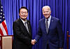 President Yoon Suk Yeol, left, and U.S. President Joe Biden shake hands after bilateral talks in Phnom Penh, Cambodia, on Nov. 13, 2022, on the sidelines of Asean meetings. [PRESIDENTIAL OFFICE]