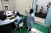 Conservation scientists at the National Museum of Korea take an X-ray of a Buddhist statue. [NATIONAL MUSEUM OF KOREA]