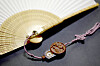 The knots that are used to attach the handle part of the fan are called seonchu. [SOLUNA LIVING]