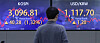 A screen in Hana Bank's trading room in central Seoul shows the Kospi closing at 3,096.81 points on Tuesday, up 40.28 points, or 1.32 percent, from the previous trading day. [YONHAP]