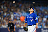 Ryu Hyun-jin of the Toronto Blue Jays watches a hit fly over his head in the first inning of an MLB game against the Baltimore Orioles at Rogers Centre on in Toronto on Tuesday.  [AFP/YONHAP]
