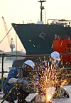 Shipbuilding companies are struggling to find a workforce despite securing a large number of orders. Pictured are employees working on ship construction at HD Hyundai Heavy Industries (HHI) in Ulsan. [HD HHI]
