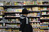 A customer shops at a discount mart in Seoul on April 20. [YONHAP]
