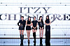 ITZY poses during a press conference on Friday for its EP “Cheshire,” which drops on Nov. 30, at the Fairmont Ambassador Seoul in Yeouido, western Seoul. [JYP ENTERTAINMENT]