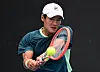 Kwon Soon-woo in action during his first round match against Denmark's Holger Rune on Monday at the Australian Open in Melbourne Park, Melbourne. [REUTERS/YONHAP]