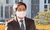 Supreme Court Chief Justice Kim Myeong-su enters the court in Seocho District of southern Seoul on Friday. [YONHAP]