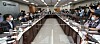 The Minimum Wage Commission meets in Sejong, Thursday, for the initial meeting to decide on next year's minimum wage. A transparent wall was put up between participants to prevent infections. The minimum wage is updated on an annual basis, and currently stands at 8,590 won ($7.22) per hour. [YONHAP]