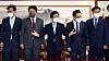 National Assembly Speaker Park Byeong-seug, center, poses with the Rep. Park Hong-keun, Democratic Party floor leader, second from right, and Rep. Kweon Seong-dong, People Power Party floor leader, second from left, ahead of a meeting Tuesday morning to discuss renegotiating a compromise on a bill at the National Assembly in Yeouido, western Seoul. [KIM SANG-SEON]
