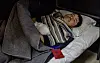 A North Korean soldier wounded and captured by Ukrainian forces are seen in this photo posted on Ukrainian President Volodymyr Zelensky's Telegram channel on Jan. 11. [SCREEN CAPTURE]