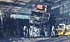 The police and firefighters inspect the garbage truck a day after a fire broke out from the truck on the Second Gyeongin Expressway killing five people last Thursday. [YONHAP]