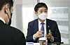 Kim Joo-hyun, chairman of the Financial Services Commission, speaks at a meeting held to root out illegal short selling in western Seoul on Thursday. [YONHAP]