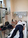 The Seoul Central District Prosecutors' Office released a photo Wednesday that Jeong Jin-ung, a senior prosecutor of the office, lying on a bed of an emergency room. [YONHAP]