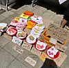 A day in the life of Kim's Fruits' nationwide tour involves fruit T-shirts, plastic baskets and cardboard cutouts with messy handwriting. [KIM'S FRUITS]