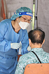 A man gets tested for Covid-19 at a makeshift testing camp in Daegu on Monday. The daily number of people newly infected with the virus has been rapidly increasing recently. Last week, the daily average number of people infected with the virus amounted to 45,529, a 17 percent increase from the previous week. Additionally, there were three days last week where the number of newly infected people was above 50,000, which was a first in six months. [NEWS1]