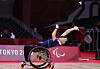 Lee Dong-seop stretches for the shuttlecock during a game at the 2020 Tokyo Paralympics on Saturday. [YONHAP]