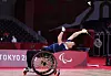 Lee Dong-seop stretches for the shuttlecock during a game at the 2020 Tokyo Paralympics on Saturday. [YONHAP]