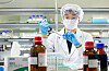 An SK Bioscience researcher conducts tests to develop a Covid-19 vaccine at the company's lab. [SK BIOSCIENCE]