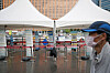 A man walks by a Covid-19 testing center in Seoul Station Square in Jung District, central Seoul, on Monday. [NEWS1]