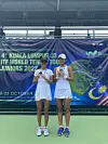 Jang Ga-eul, left, and Choi On-yu pose for a picture after the medal ceremony for the J3 ITF World Tennis Tour Juniors 2022 tennis tournament in Kuala Lumpur on Sunday. Jang won the girls’ singles gold medal, beating Choi in the final. The two also came together to win the doubles gold at the event, allowing Jang to sweep the medal table. [SPORTIZEN]