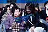 Kim Jeong-ja, left, 83, the oldest person to take the 2024 College Scholastic Ability Test (CSAT), takes part in an entrance ceremony for Sookmyung Women's University in central Seoul on Monday. Kim will become a freshman majoring in social welfare at the university’s Future Education Institute. Born in 1941, Kim had to flee when the 1950-53 Korean War broke out around the time she entered elementary school. [NEWS1]