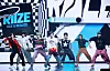 Riize performing its debut track ″Get A Guitar″ on Monday during a showcase held at the Blue Square music venue in central Seoul [YONHAP]