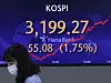 A screen in Hana Bank's trading room in central Seoul shows the Kospi closing at 3,199.27, 55.08 points, or 1.75 percent, from the previous trading day. [NEWS1]
