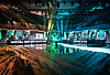 The stage for the 2021 Mid-Season Invitational finals is lit with Royal Never Give Up and DWG KIA's respective colors. [RIOT GAMES]