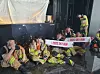 The madlads who made the climb in full bunker gear. A fully outfitted firefighter carries around 27 kilograms (60 pounds) of gear. [TOM MCCARTHY]