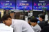 Screens in Hana Bank's trading room in central Seoul show stock and foreign exchange markets close on Wednesday. [YONHAP]