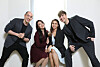 Co-founders of Wave Entertainment Tyler Rasch, far left, and Julian Quintart, far right, pose for photos with Sarah Soo Kyung Henriet, second from left, and Nidhi Agrawal before an interview with the Korea JoongAng Daily on Monday at the agency's office in Itaewon, central Seoul. [PARK SANG-MOON]