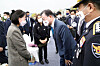 President Moon Jae-in, right, consoles family members of a police officer who died on duty at the 75th National Police Day ceremony held at the Police Training Institute in Asan, South Chungcheong. [JOINT PRESS CORPS]