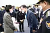 President Moon Jae-in, right, consoles family members of a police officer who died on duty at the 75th National Police Day ceremony held at the Police Training Institute in Asan, South Chungcheong. [JOINT PRESS CORPS]