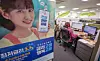 The Korea Housing Finance Corporation (HF) started switching floating rate mortgages to fixed-rate mortgages on Thursday. Annual interest rates can be fixed at a low of 3.7 percent according to a loaner's income and age. Submissions can be made either at HF or six major banks in Korea, including KB Kookmin, Woori, Shinhan and Hana. An employee takes calls at a customer service center for the mortgage project in Mapo District, western Seoul, on Thursday. [YONHAP]