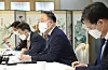Finance Minister Hong Nam-ki, center, speaks at a meeting on real estate at the government complex in Seoul on Thursday. [YONHAP]
