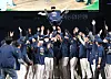 The NC Dinos throw owner Kim Taek-jin in the air after winning the KBO pennant at Changwon NC Park in Changwon, South Gyeongsang on Saturday. [YONHAP]
