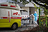 A coronavirus patient at a hospital for senior citizens in Busan gets transferred to a different hospital Wednesday after developing severe symptoms. At least 53 Covid-19 cases have been traced to the Busan hospital, making it the largest cluster the city has seen. [YONHAP]