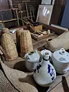 Old documents, tools, bottles and equipment are displayed in the brewery’s former guksil, a room that was used to create nuruk on rectangular wooden trays. [YIM SEUNG-HYE]