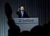 A journalist raises her hand to ask a question to Japan's SoftBank Group CEO Masayoshi Son during a news conference in Tokyo, November 5, 2018. [REUTERS]