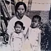 Yoo's mother, Yoo and her brother are featured in this black-and-white photo. [MOKDO BREWERY]