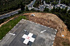 An aerial view shows an EHang air taxi, an autonomous electric vertical takeoff and landing aircraft flying near a helicopter pad at Hadassah Ein Kerem Hospital, in Jerusalem on Sept. 12, 2023. [REUTERS/YONHAP]