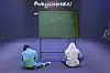 A scene from #whysocerealz!'s Seoul Fashion Week 2023 Fall/Winter show last month. Here shows two models sitting in front of a chalkboard that is covered with equations, appearing stumped. [#WHYSOCEREALZ!]