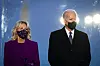 U.S. President-elect Joe Biden, right, and his wife Jill Biden, wear masks at the Lincoln Memorial Reflecting Pool during a Covid-19 memorial in Washington Tuesday on the eve of his inauguration Wednesday. [UPI/YONHAP]